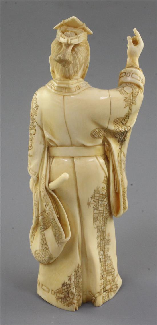 A Japanese ivory figure of a courtier, Meiji period, signed Masatoshi, 16.5cm